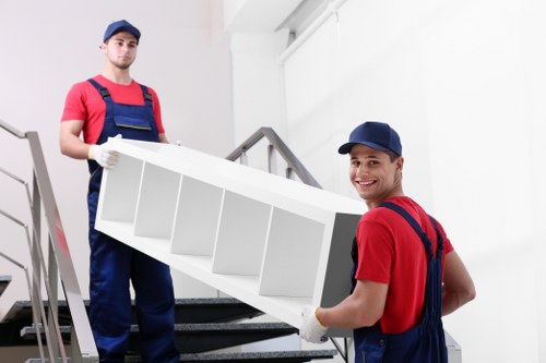 Office removal planning in North Kensington with packed boxes and business furniture
