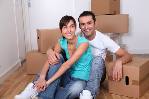 Packing boxes and household items ready for moving in North Kensington