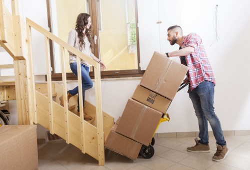 Office furniture and boxes being prepared for a commercial move