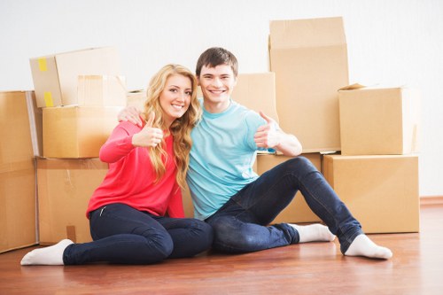 Careful labelling and boxing during a packing service in North Kensington