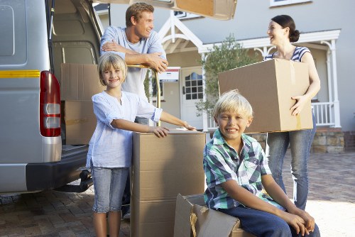 Packed boxes and moving supplies ready for a North Kensington home move