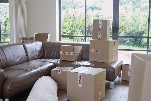 Local moving team assisting with access and loading in North Kensington